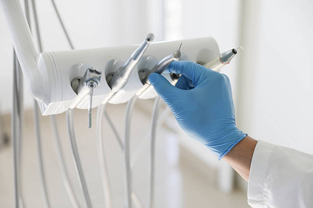 Professional Tooth Extraction technician working in Oak Grove, TN